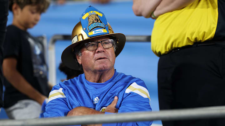 Sep 12, 2025; Pasadena, California, USA;  An UCLA Bruins fan looks on during the second half against the New Mexico Lobos at Rose Bowl. Mandatory Credit: Kiyoshi Mio-Imagn Images
