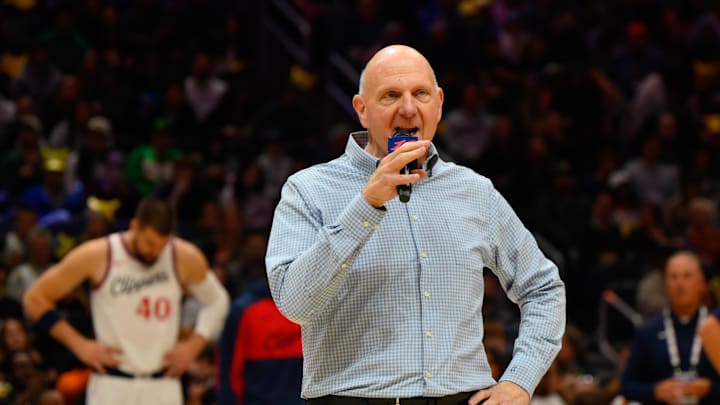 Oct 11, 2024; Seattle, Washington, USA; Los Angeles Clippers owner Steve Ballmer speaks to the crowd before the game between the Los Angeles Clippers and the Portland Trail Blazers at Climate Pledge Arena. Mandatory Credit: Steven Bisig-Imagn Images