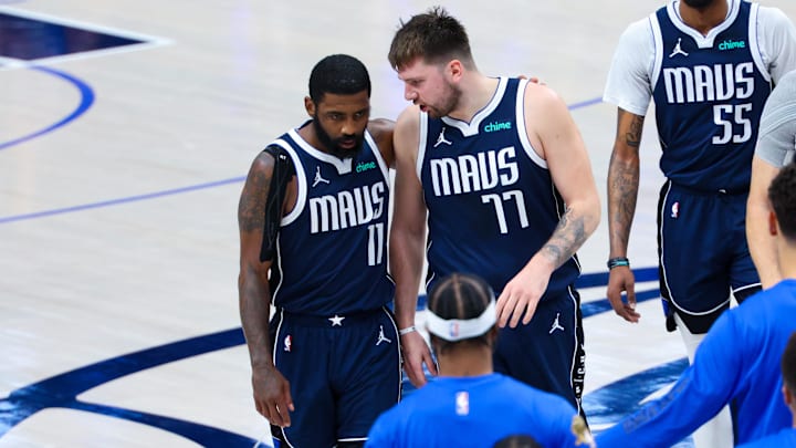 Jun 14, 2024; Dallas, Texas, USA; Dallas Mavericks guard Kyrie Irving (11) reacts with Dallas Mavericks guard Luka Doncic (77) during the second half against the Boston Celtics during game four of the 2024 NBA Finals at American Airlines Center. Mandatory Credit: Kevin Jairaj-Imagn Images