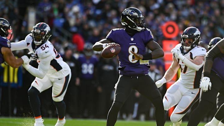Dec 4, 2022; Baltimore, Maryland, USA;  Baltimore Ravens quarterback Lamar Jackson (8) drops back to pass during the first quarter against the Denver Broncos at M&T Bank Stadium. Mandatory Credit: Tommy Gilligan-Imagn Images