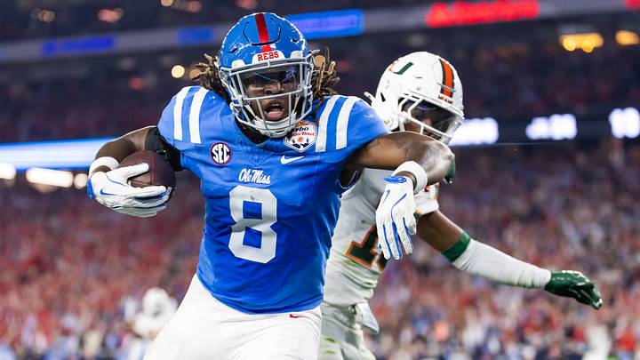 Mississippi Rebels tight end Dae'Quan Wright scores a touchdown against the Miami Hurricanes Mississippi Rebels tight end Dae'Quan Wright scores a touchdown against the Miami Hurricanes