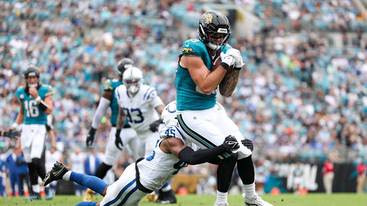 Oct 6, 2024; Jacksonville, Florida, USA; Indianapolis Colts linebacker E.J. Speed (45) tackles Jacksonville Jaguars tight end Luke Farrell (89) short if the end zone in the second quarter at EverBank Stadium. Mandatory Credit: Nathan Ray Seebeck-Imagn Images