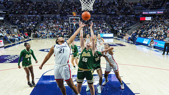Carla Brito, shown here in a regular-season game at UConn, led USF past Tulane with 15 points and 17 rebounds in the Bulls' American Athletic Conference tournament opener.