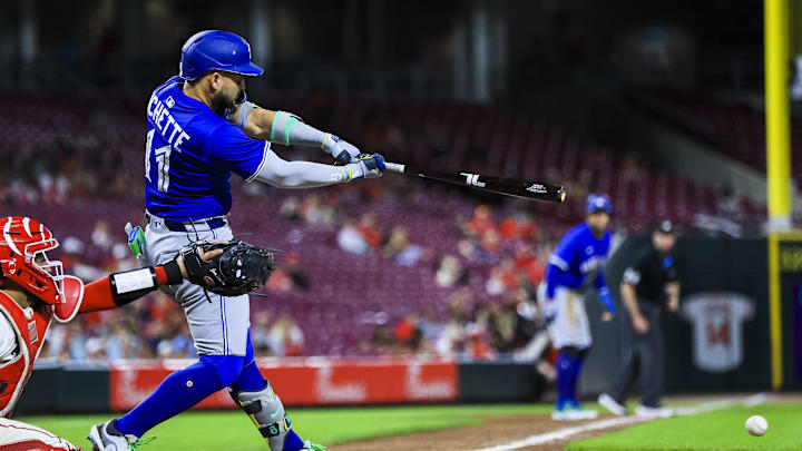 Sep 3, 2025; Cincinnati, Ohio, USA; Toronto Blue Jays shortstop Bo Bichette (11) hits a fielder’s choice RBI in the eighth inning against the Cincinnati Reds at Great American Ball Park. Mandatory Credit: Katie Stratman-Imagn Images