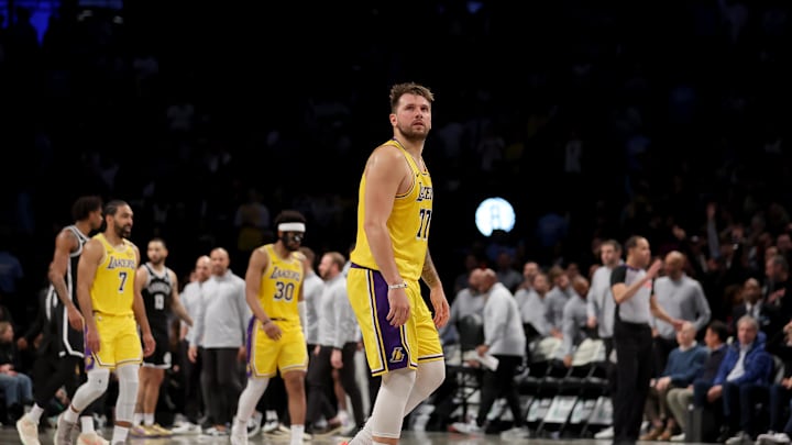 Mar 10, 2025; Brooklyn, New York, USA; Los Angeles Lakers guard Luka Doncic (77) reacts during the fourth quarter against the Brooklyn Nets at Barclays Center. Mandatory Credit: Brad Penner-Imagn Images