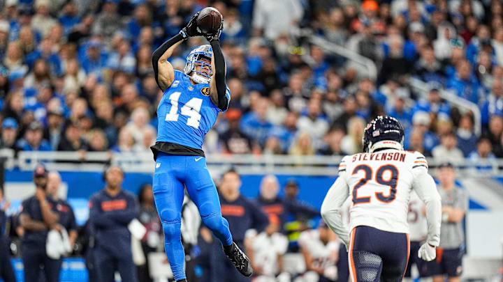 Detroit Lions wide receiver Amon-Ra St. Brown (14) makes a catch against Chicago Bears cornerback Tyrique Stevenson (29) during the first half at Ford Field in Detroit on Thursday, Nov. 28, 2024. Detroit Lions wide receiver Amon-Ra St. Brown (14) makes a catch against Chicago Bears cornerback Tyrique Stevenson (29) during the first half at Ford Field in Detroit on Thursday, Nov. 28, 2024.