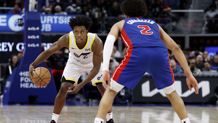 Dec 19, 2024; Detroit, Michigan, USA;  Utah Jazz guard Collin Sexton (2) dribbles defended by Detroit Pistons guard Cade Cunningham (2) in the third quarter at Little Caesars Arena. Mandatory Credit: Rick Osentoski-Imagn Images