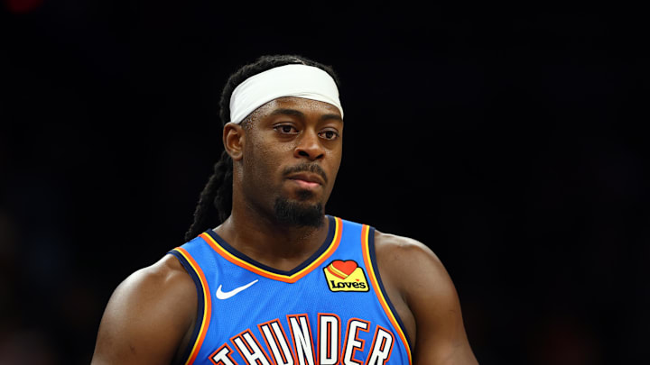 Apr 27, 2026; Phoenix, Arizona, USA; Oklahoma City Thunder guard Luguentz Dort (5) against the Phoenix Suns during game four of the first round of the 2026 NBA Playoffs at Mortgage Matchup Center. Mandatory Credit: Mark J. Rebilas-Imagn Images