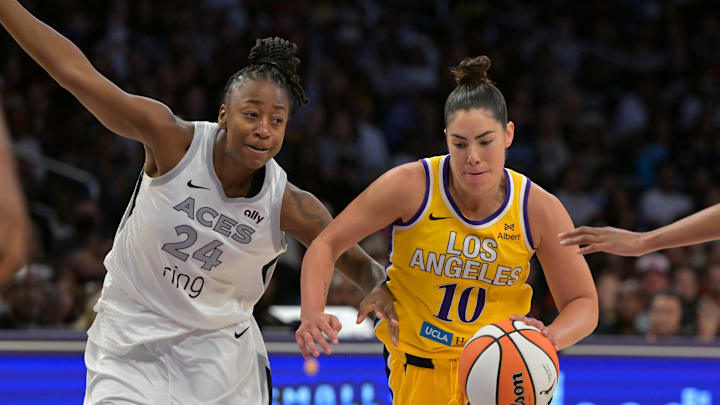 Sep 11, 2025; Los Angeles, California, USA; Los Angeles Sparks guard Kelsey Plum (10) is defended by Las Vegas Aces guard Jewell Loyd (24) as she drives to the basket during the second half at Crypto.com Arena. Mandatory Credit: Jayne Kamin-Oncea-Imagn Images