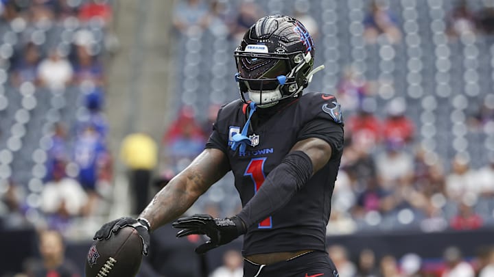 Oct 6, 2024; Houston, Texas, USA; Houston Texans wide receiver Stefon Diggs (1) warms up before the game against the Buffalo Bills at NRG Stadium. Mandatory Credit: Troy Taormina-Imagn Images