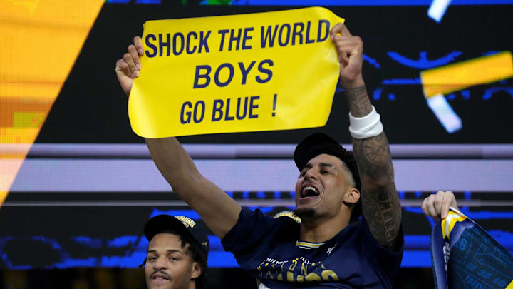 Michigan Wolverines forward Yaxel Lendeborg (23) celebrates the teamâ€™s NCAA men's basketball tournament national championship victory Monday, April 6, 2026, after defeating the UConn Huskies 69-63 at Lucas Oil Stadium in Indianapolis.