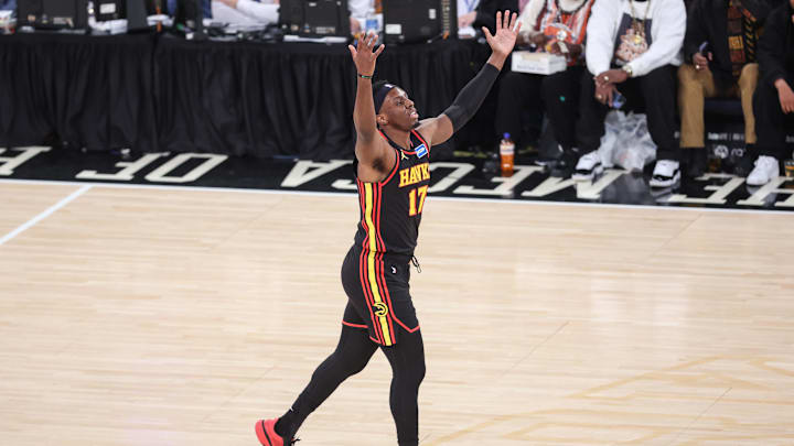 Jan 2, 2026; New York, New York, USA;  Atlanta Hawks forward Onyeka Okongwu (17) celebrates after making a three point shot in the first quarter against the New York Knicks at Madison Square Garden. Mandatory Credit: Wendell Cruz-Imagn Images