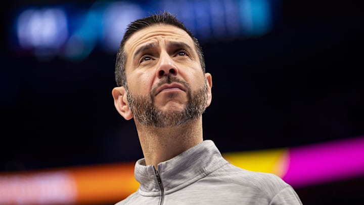Feb 11, 2022; Detroit, Michigan, USA; Charlotte Hornets head coach James Borrego looks up as he walks off the court after the game against the Detroit Pistons at Little Caesars Arena. Mandatory Credit: Raj Mehta-Imagn Images