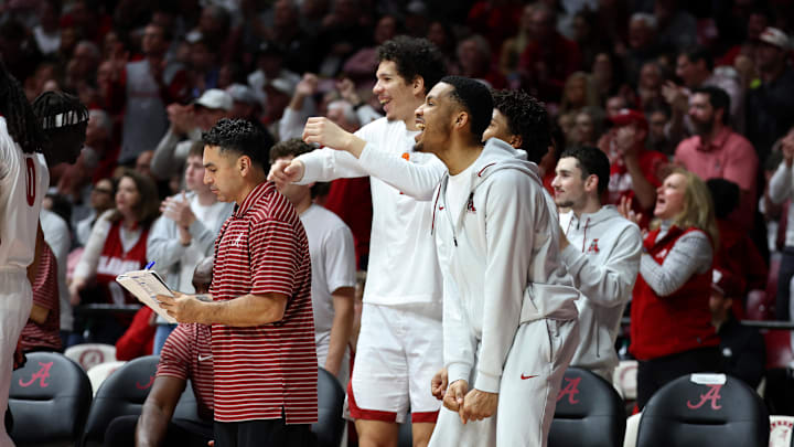 Jan 3, 2026; Tuscaloosa, Alabama, USA; Alabama Crimson Tide bench players react during the first half against the Kentucky Wildcats at Coleman Coliseum.