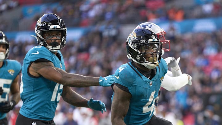 Oct 20, 2024; London, United Kingdom; Jacksonville Jaguars running back Tank Bigsby (4) celebrates a touchdown in the second half during an NFL International Series game at Wembley Stadium. Mandatory Credit: Peter van den Berg-Imagn Images
