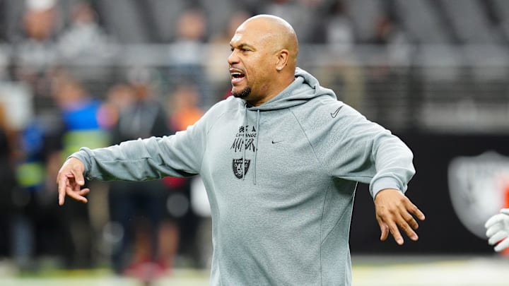Dec 22, 2024; Paradise, Nevada, USA; Las Vegas Raiders head coach Antonio Pierce directs players on the field before a game against the Jacksonville Jaguars at Allegiant Stadium. Mandatory Credit: Stephen R. Sylvanie-Imagn Images
