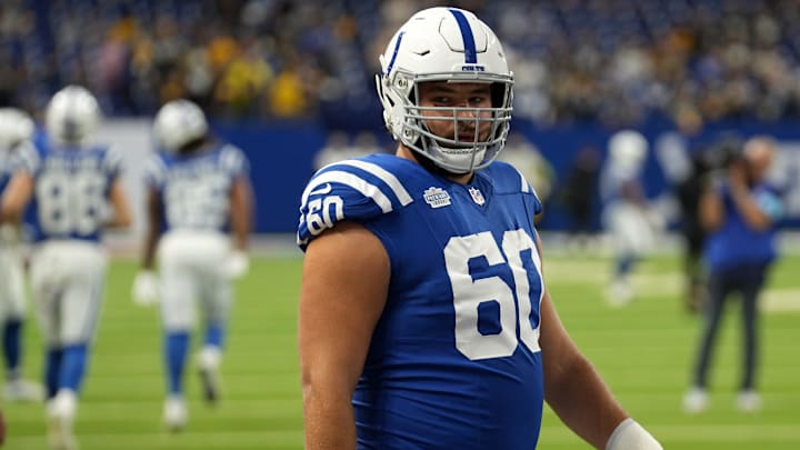 Indianapolis Colts guard Tanor Bortolini (60) warms up before a game against the Pittsburgh Steelers on Sunday, Sept. 29, 2024, at Lucas Oil Stadium in downtown Indianapolis.