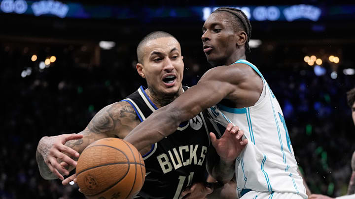 Nov 14, 2025; Milwaukee, Wisconsin, USA; Charlotte Hornets forward Moussa Diabate (14) knocks the ball away from Milwaukee Bucks forward Kyle Kuzma (18) during the fourth quarter at Fiserv Forum. Mandatory Credit: Jeff Hanisch-Imagn Images Nov 14, 2025; Milwaukee, Wisconsin, USA; Charlotte Hornets forward Moussa Diabate (14) knocks the ball away from Milwaukee Bucks forward Kyle Kuzma (18) during the fourth quarter at Fiserv Forum. Mandatory Credit: Jeff Hanisch-Imagn Images