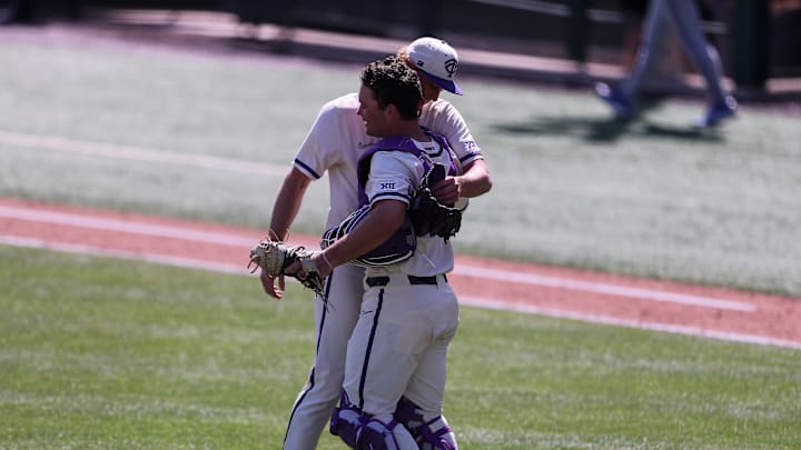 Mason Brassfield and Karson Bowen celebrate the series sweep vs No. 22 Kansas. 