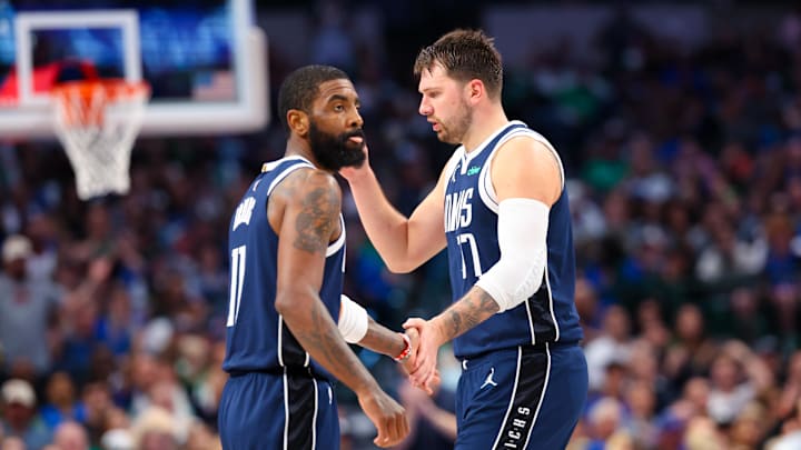 Mar 17, 2024; Dallas, Texas, USA;  Dallas Mavericks guard Kyrie Irving (11) celebrates with Dallas