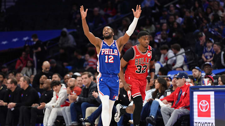 Apr 13, 2025; Philadelphia, Pennsylvania, USA; Philadelphia 76ers guard Quentin Grimes (5) reacts after scoring against the Chicago Bulls in the fourth quarter at Wells Fargo Center. Mandatory Credit: Kyle Ross-Imagn Images