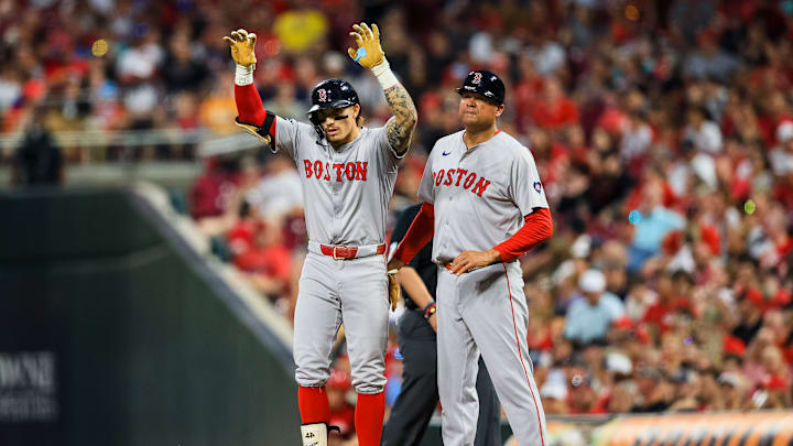 Jun 21, 2024; Cincinnati, Ohio, USA; Boston Red Sox outfielder Jarren Duran (16) reacts after hitting a single against the Cincinnati Reds in the eighth inning at Great American Ball Park.