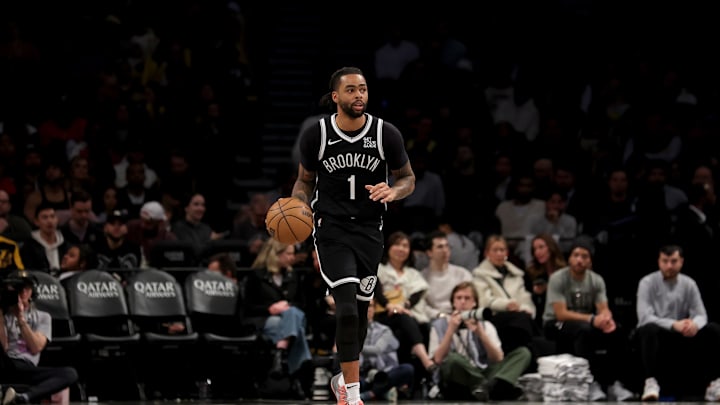 Mar 10, 2025; Brooklyn, New York, USA; Brooklyn Nets guard D'Angelo Russell (1) brings the ball up court against the Los Angeles Lakers during the third quarter at Barclays Center. Mandatory Credit: Brad Penner-Imagn Images Mar 10, 2025; Brooklyn, New York, USA; Brooklyn Nets guard D'Angelo Russell (1) brings the ball up court against the Los Angeles Lakers during the third quarter at Barclays Center. Mandatory Credit: Brad Penner-Imagn Images