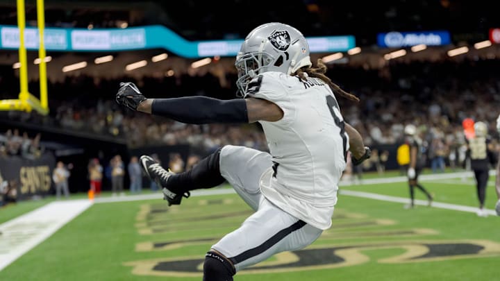 Dec 29, 2024; New Orleans, Louisiana, USA; Las Vegas Raiders running back Ameer Abdullah (8) celebrates a touchdown that was later ruled one yard short against the Las Vegas Raiders during the first half at Caesars Superdome. The Raiders eventually scored a field goal during the drive. Mandatory Credit: Matthew Hinton-Imagn Images