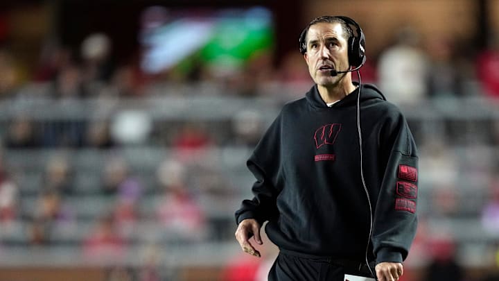 Nov 22, 2025; Madison, Wisconsin, USA; Wisconsin Badgers head coach Luke Fickell looks on during a timeout  in the second half against the Illinois Fighting Illini at Camp Randall Stadium. Mandatory Credit: Kayla Wolf-Imagn Images