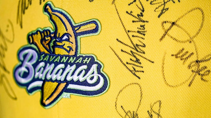 A fan waits to get their hat signed Friday, June 30, 2023, during the Savannah Bananas World Tour at Victory Field in Indianapolis.