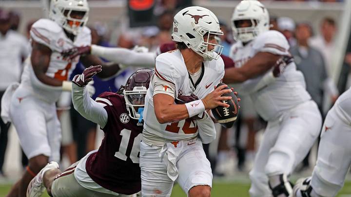 Mississippi State Bulldogs linebacker Derion Gullette sacks Texas Longhorns quarterback Arch Manning. Mandatory Credit: Petre Thomas-Imagn Images