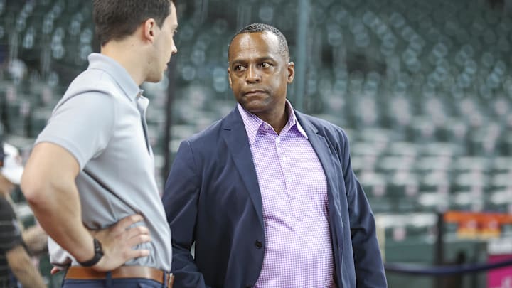 Aug 31, 2024; Houston, Texas, USA; Houston Astros general manager Dana Brown (right) talks before the game against the Kansas City Royals at Minute Maid Park. Mandatory Credit: Troy Taormina-Imagn Images