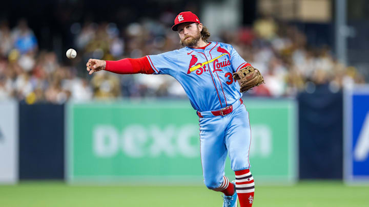 Aug 2, 2025; San Diego, California, USA; St. Louis Cardinals second baseman Brendan Donovan (33) throws to first base for an out during the eighth inning against the San Diego Padres at Petco Park. Mandatory Credit: David Frerker-Imagn Images