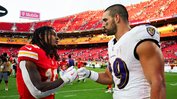 Sep 28, 2025; Kansas City, Missouri, USA; Baltimore Ravens tight end Mark Andrews (89) and Kansas City Chiefs running back Isiah Pacheco (10) greet each other on the field after the game at GEHA Field at Arrowhead Stadium. Mandatory Credit: Denny Medley-Imagn Images