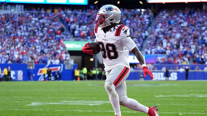 New England Patriots running back Rhamondre Stevenson (38) scores a two point conversion during the fourth quarter against the Buffalo Bills at New Highmark Stadium. New England Patriots running back Rhamondre Stevenson (38) scores a two point conversion during the fourth quarter against the Buffalo Bills at New Highmark Stadium.