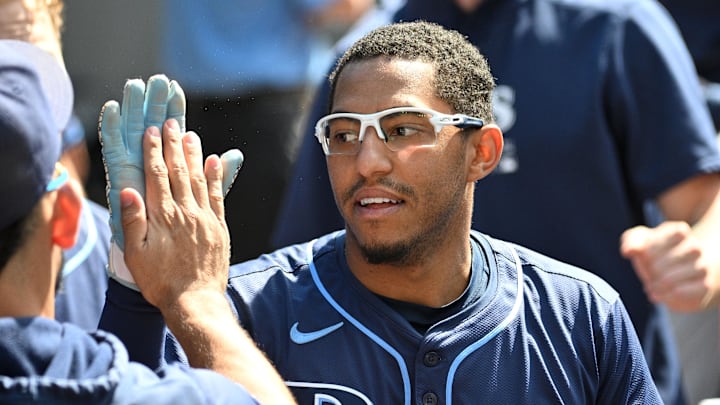 Toronto, Ontario, CAN; Tampa Bay Rays second baseman Richie Palacios (1) celebrates in the dugout with teammates after scoring against the Toronto Blue Jays in the third inning at Rogers Centre.