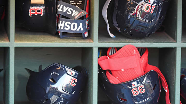 Jul 21, 2025; Philadelphia, Pennsylvania, USA; Boston Red Sox batting helmets in the dugout against the Philadelphia Phillies at Citizens Bank Park. Mandatory Credit: Eric Hartline-Imagn Images