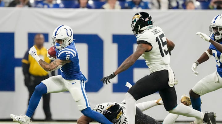 Indianapolis Colts wide receiver Anthony Gould (6) steps away from Jacksonville Jaguars safety Daniel Thomas (20) as Jacksonville Jaguars wide receiver Tim Jones (15) moves in for the tackle Sunday, Jan. 5, 2025, during a game against the Jacksonville Jaguars at Lucas Oil Stadium in Indianapolis. Indianapolis Colts wide receiver Anthony Gould (6) steps away from Jacksonville Jaguars safety Daniel Thomas (20) as Jacksonville Jaguars wide receiver Tim Jones (15) moves in for the tackle Sunday, Jan. 5, 2025, during a game against the Jacksonville Jaguars at Lucas Oil Stadium in Indianapolis.