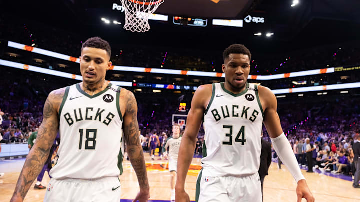 Mar 24, 2025; Phoenix, Arizona, USA; Milwaukee Bucks forward Kyle Kuzma (18) and forward Giannis Antetokounmpo (34) against the Phoenix Suns at Footprint Center. Mandatory Credit: Mark J. Rebilas-Imagn Images