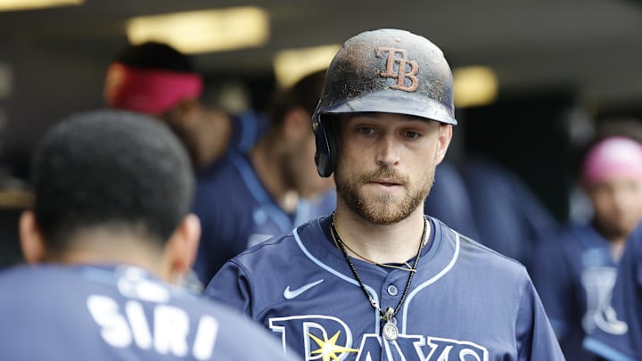 Sep 24, 2024; Detroit, Michigan, USA;  Tampa Bay Rays second baseman Brandon Lowe (8) receives congratulations from teammates after he hits a home run in the ninth inning against the Detroit Tigers at Comerica Park. 