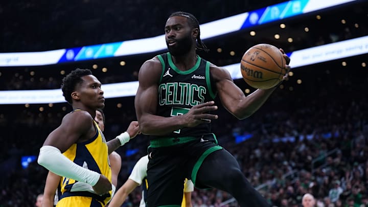 Dec 27, 2024; Boston, Massachusetts, USA; Boston Celtics guard Jaylen Brown (7) passes the ball against the Indiana Pacers in the first quarter at TD Garden. Mandatory Credit: David Butler II-Imagn Images