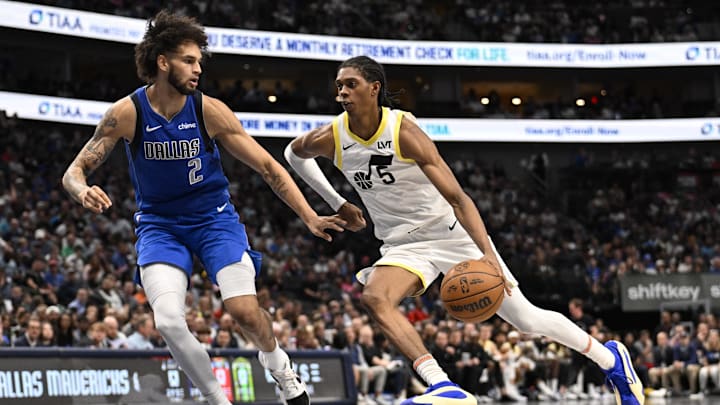 Oct 28, 2024; Dallas, Texas, USA; Dallas Mavericks center Dereck Lively II (2) and Utah Jazz forward Cody Williams (5) in action during the game between the Dallas Mavericks and the Utah Jazz at the American Airlines Center. Mandatory Credit: Jerome Miron-Imagn Images
