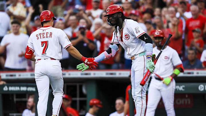 Aug 16, 2025; Cincinnati, Ohio, USA; Cincinnati Reds first baseman Spencer Steer (7) high fives shortstop Elly De La Cruz (44) after hitting a solo home run in the sixth inning against the Milwaukee Brewers at Great American Ball Park. Mandatory Credit: Katie Stratman-Imagn Images Aug 16, 2025; Cincinnati, Ohio, USA; Cincinnati Reds first baseman Spencer Steer (7) high fives shortstop Elly De La Cruz (44) after hitting a solo home run in the sixth inning against the Milwaukee Brewers at Great American Ball Park. Mandatory Credit: Katie Stratman-Imagn Images