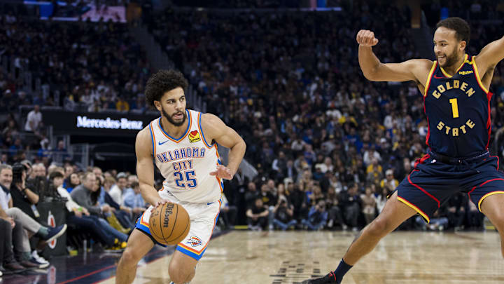 Nov 27, 2024; San Francisco, California, USA; Oklahoma City Thunder guard Ajay Mitchell (25) drives past Golden State Warriors forward Kyle Anderson (1) during the first half at Chase Center. Mandatory Credit: John Hefti-Imagn Images Nov 27, 2024; San Francisco, California, USA; Oklahoma City Thunder guard Ajay Mitchell (25) drives past Golden State Warriors forward Kyle Anderson (1) during the first half at Chase Center. Mandatory Credit: John Hefti-Imagn Images
