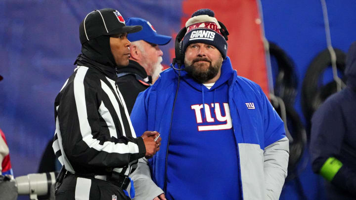 Dec 11, 2023; East Rutherford, New Jersey, USA; New York Giants head coach Brian Daboll talks to an official during the first quarter of the game against the Green Bay Packers at MetLife Stadium. Mandatory Credit: Robert Deutsch-USA TODAY Sports