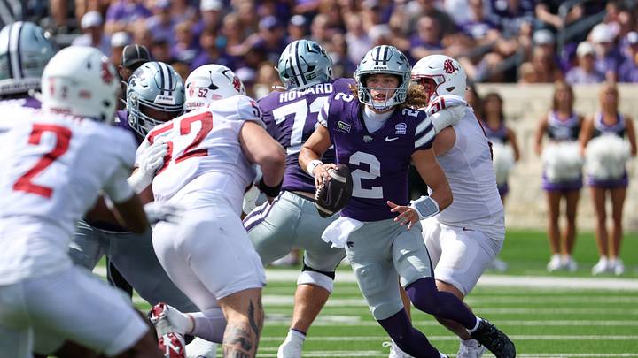 Sep 12, 2026; Manhattan, Kansas, USA; Kansas State Wildcats quarterback Avery Johnson (2) scrambles during the first quarter against the Washington State Cougars at Bill Snyder Family Football Stadium. Sep 12, 2026; Manhattan, Kansas, USA; Kansas State Wildcats quarterback Avery Johnson (2) scrambles during the first quarter against the Washington State Cougars at Bill Snyder Family Football Stadium.