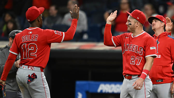 May 30, 2025; Cleveland, Ohio, USA; Los Angeles Angels right fielder Jorge Soler (12) and designated hitter Mike Trout (27) celebrate after the Angels beat the Cleveland Guardians at Progressive Field. Mandatory Credit: Ken Blaze-Imagn Images May 30, 2025; Cleveland, Ohio, USA; Los Angeles Angels right fielder Jorge Soler (12) and designated hitter Mike Trout (27) celebrate after the Angels beat the Cleveland Guardians at Progressive Field. Mandatory Credit: Ken Blaze-Imagn Images