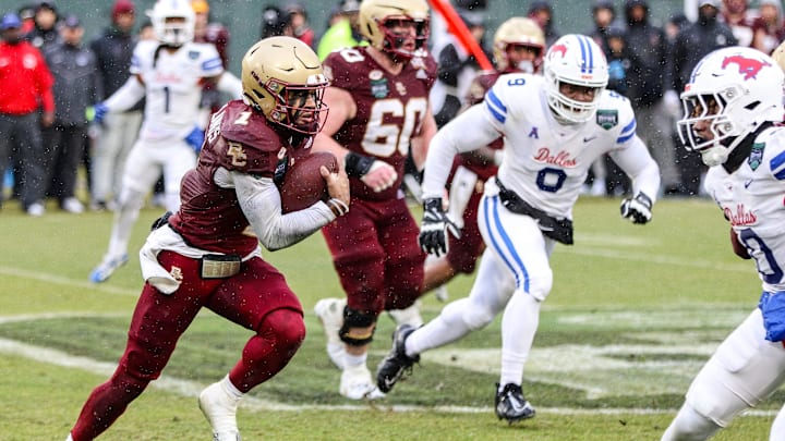 Boston College's Thomas Castellanos carries the ball during the second annual Wasabi Fenway Bowl vs. SMU at Fenway Park on Thursday, Dec. 28, 2023.