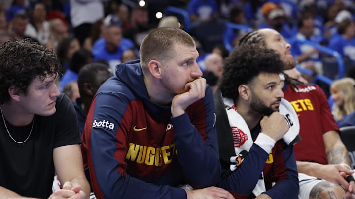 May 18, 2025; Oklahoma City, Oklahoma, USA; Denver Nuggets center Nikola Jokic (15) watches the game from the bench in the fourth quarter against the Oklahoma City Thunder in game seven of the second round for the 2025 NBA Playoffs at Paycom Center. Mandatory Credit: Alonzo Adams-Imagn Images May 18, 2025; Oklahoma City, Oklahoma, USA; Denver Nuggets center Nikola Jokic (15) watches the game from the bench in the fourth quarter against the Oklahoma City Thunder in game seven of the second round for the 2025 NBA Playoffs at Paycom Center. Mandatory Credit: Alonzo Adams-Imagn Images