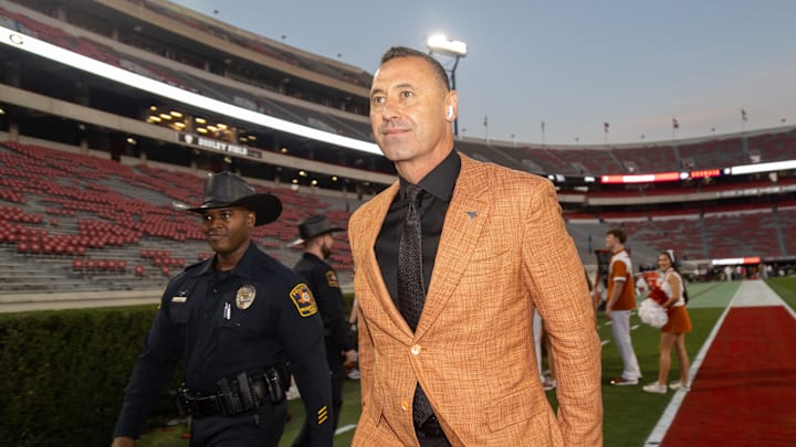 Nov 15, 2025; Athens, Georgia, USA; Texas Longhorns head coach Steve Sarkisian walks into Sanford Stadium before a game against the Georgia Bulldogs. Mandatory Credit: Brett Davis-Imagn Images